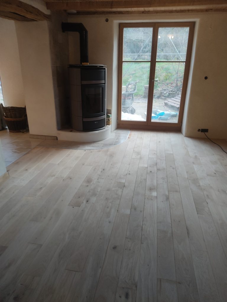 piquard-revetement - parquet et carrelage autour d'un poêle