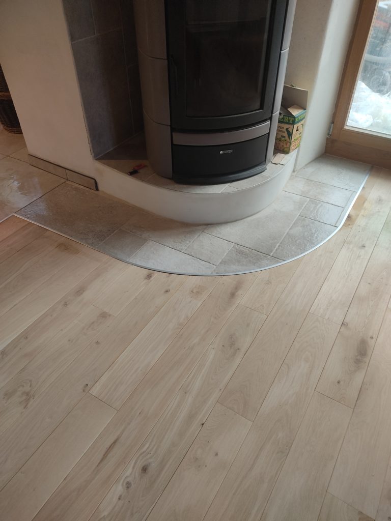 piquard-revetement - parquet et carrelage autour d'un poêle